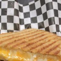 Triple X Melt · A blend of cheddar Jack, mozzarella, and American cheeses, served with house made chips or F...