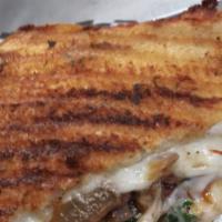 Veggielicious Melt · Mushrooms, spinach, tomatoes, black olives, caramelized onions, mozzarella cheese, garlic he...