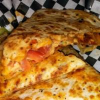 716 Quesadilla · House made crispy or grilled chicken, lettuce, tomato, cheddar Jack cheese, Buffalo sauce, g...