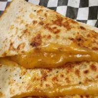 Cheese Quesadilla · Cheddar Jack cheese on grilled tortilla , served with a side