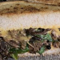 Short Rib Grilled Cheese · Braised beef served with balsamic onions, arugula, and cheese on panini-pressed sourdough br...