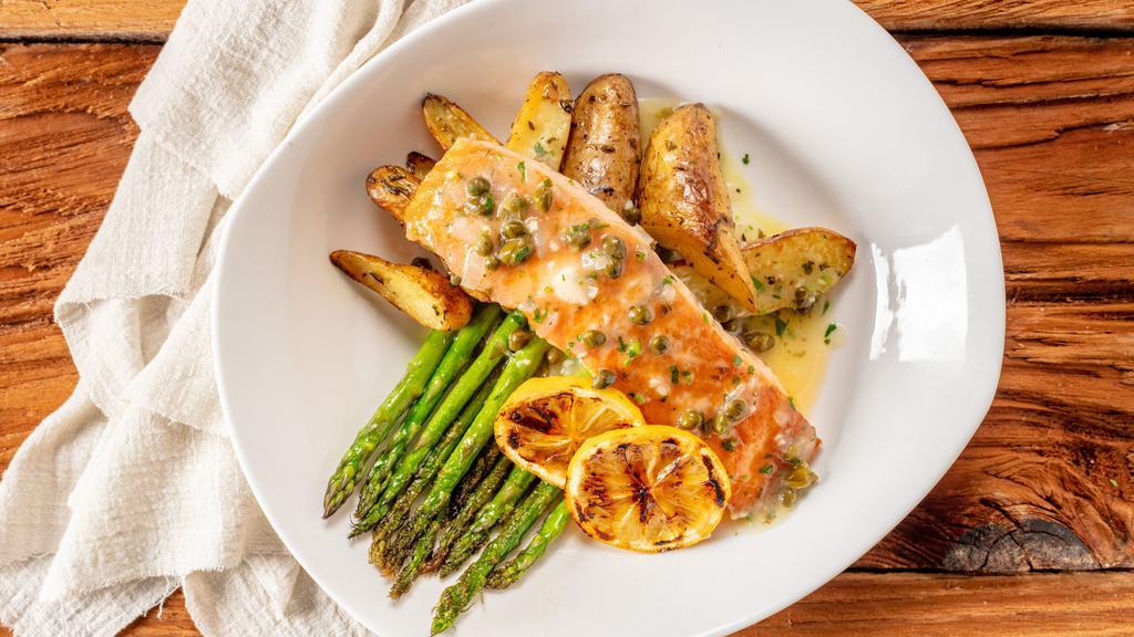 Pan Roasted Wild Salmon · Served with lemon-caper butter, fingerling potatoes, and asparagus.