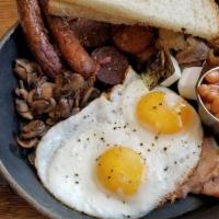 Irish Breakfast · Eggs, Irish bacon, Irish sausage, black & white pudding, sauteed mushrooms, grilled tomato &...