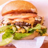 The Bridge Burger · Beyond burger, mozzcheez, lettuce, tomato, potato stix, corn, pink sauce.