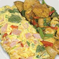 Western Omelet · Eggs, ham, peppers, onion.