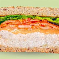 Tuna Melt Sandwich · Tuna, sharp cheddar cheese, sliced tomato, lettuce, on multigrain bread.