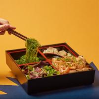 Shrimp Bento Box · Served with steamed rice, 3 pieces fried dumplings, seaweed salad and garden salad.