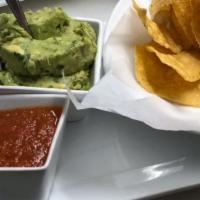 Guacamole & Salsa · Homemade Corn Tortilla Chips, Homemade Guacamole & Salsa.