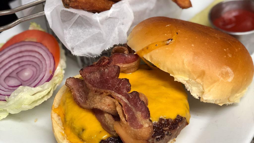 Park Place Burger · Bacon, Cheddar, Lettuce, Tomato, Onion, Brioche Bun.