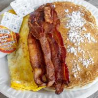 The Hungry Man Special With Taylor Ham · 2 eggs any style and choice of French toast or pancakes.