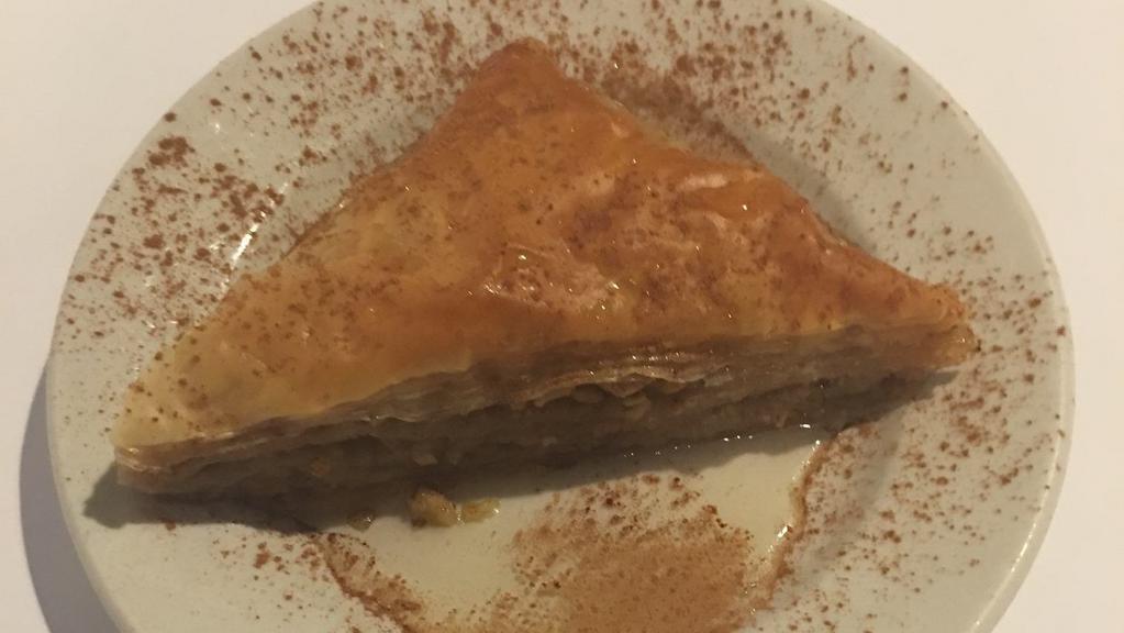 Baklava · Phyllo dough layered with walnuts and honey syrup.
