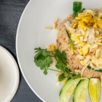Thai Fried Rice · With egg, onion and scallion.