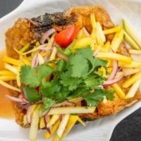 Spicy Catfish · Spicy. Deep fried filet catfish with red curry sauce with lime leaf. Served with salad and j...