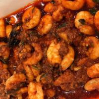 Camarones Al Ajillo · Juicy baby shrimp sautéedin fresh garlic, paprika, cilantro, and pasilla chilies. Served wit...