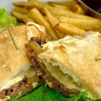 Firewood Cooked Famous French Dip Au Jus · Certified angus beef thin sliced roast prime rib of beef, caramelized onions,  and provolone...