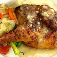 Marinated Half Chicken · All natural, served with mashed potatoes, fresh vegetables, topped with a lemon garlic fresh...