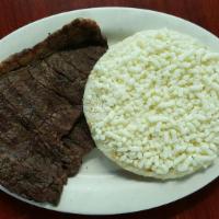 Arepa Con Queso · Corn cake with cheese.