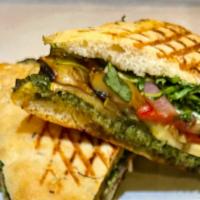 Organic Grilled Vegetable Sandwich · Green & yellow squash, grilled onions, roasted peppers, romaine lettuce, tomatoes w/ mozzare...