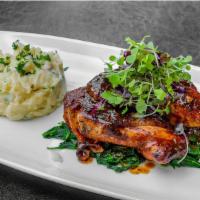 Pan Sear 1/2 Chicken · Served with mashed potatoes and gorgonzola cheese sauteed garlic spinach.