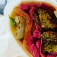 Falafel Wrap · falafel, pickles, tomatoes, red cabbage, cucumbers, hummus.