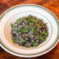 Huitlacoche Fried Rice · Vegetable fried rice with Huitlacoche. Contains egg.