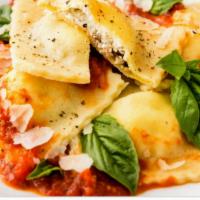 Cheese Ravioli · Homemade ravioli filled with ricotta cheese and served with your choice of white or red sauce.