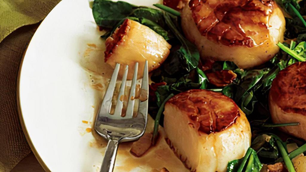 Seared Scallops & Risotto · perfectly seared diver sea scallops, served with parmesan risotto and sauteed spinach