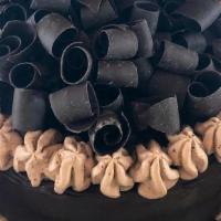 Chocolate Mousse Cake · Chocolate cake with chocolate mousse filling, enrobed with chocolate ganache and Belgian cho...