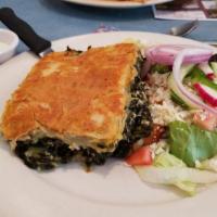 Spinach Pie · Spinach and feta cheese, served with Greek salad and rice.