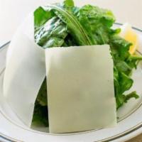 Fresh Arugula Salad · Fresh arugula served with shaved Parmigiano-Reggiano cheese.