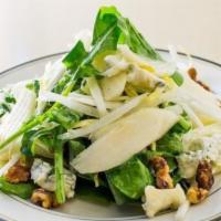 Pear & Gorgonzola Dolce Salad · Pear and gorgonzola served with arugula, endive and walnuts.