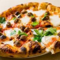 Pizza Polpettine · Baby meatballs, tomato, mozzarella and fresh sage.