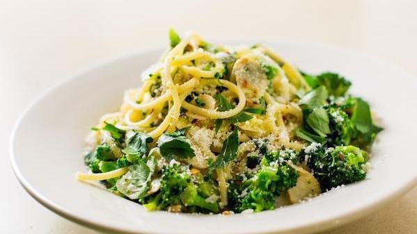 Spaghetti With Broccoli · Spaghetti with broccoli dressed in olive oil and garlic topped with parmesan cheese.