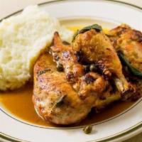 Wood Roasted Chicken · Chicken roasted in a wood-fire oven, covered in lemon, capers, sage and extra virgin olive o...