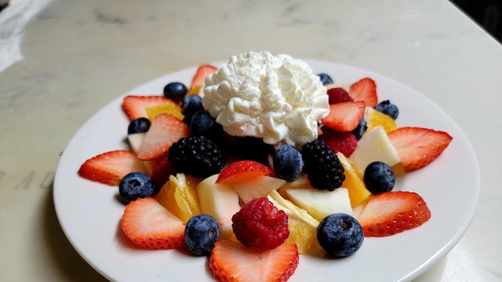 Fresh Fruit Plate · Fresh fruit with hand-whipped cream.