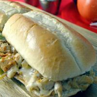 Chicken Cheesesteak · Halal chicken cheesesteak  on a 12 inch hero bread with mayo ketchup green peppers and onion...