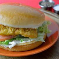 Chicken Sandwich · Halal fried chicken sandwich with lettuce, tomatoes, onions and pickles topped off with a sp...
