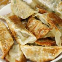 Dumplings Momo منتو · 12PCS. Homemade pieces of dough wrapped around a filling, white flour, salt, black pepper, o...