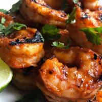 Shrimpy Grill جمبري مشوي  · Fine clay tandoori smoked Jumbo shrimps marinated in a very special sauce. Served with your ...