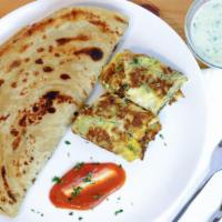 Plain Paratha With Omelette  · Plain butter bread with 2 eggs omelette with onions tomatoes jalapeños