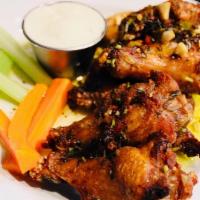 Chicken Wings · Served with homemade blue cheese celery and carrots choice of sauce.
