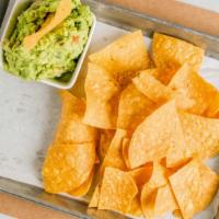 Guacamole Fresco · Fresh avocado, with tomatoes, lime, onions and cilantro served with tortilla chips.