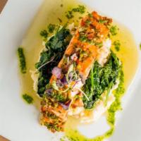 Chimichurri Salmon · Grilled Norwegian salmon, served over spinach and mashed potatoes.