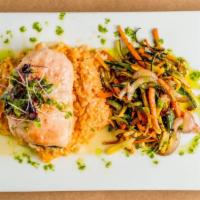Pollo Relleno · Chicken breast stuffed with Spanish ham, Gruyere cheese, served with rice and mixed vegetabl...