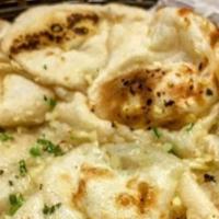 Garlic Naan · Naan stuffed with minced garlic.