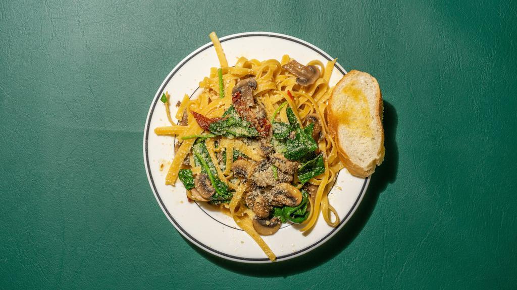 Fettuccine Marsala · Garlic, sundry tomatoes, spinach cook with marsala wine over fettuccine pasta. Add beef for an additional charge.