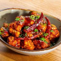 Red Hot Chili Chicken - Fried Chili Chicken · Fried chicken thigh, chili glaze, hot dried chilis, scallions, sesame seeds. 
Served with ja...
