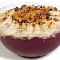 The Rider · Oat milk, acai berry puree, fresh banana and peanut butter topped with granola, cocoa nibs, ...