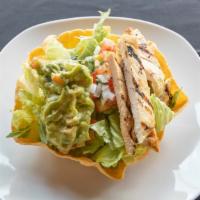 Taco Salad Bowl · Crispy flour tortilla shell filled with romaine lettuce, meat, pico de gallo.