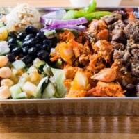 Mix Over Rice · Mix over Rice platters include rice and pita. 
With Romaine lettuce and chopped salad (onion...